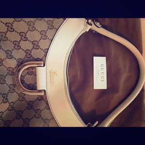 Authentic Gucci GG Canvas shoulder bag.